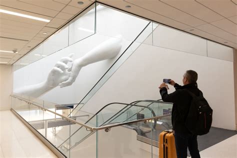 PHOTOS: New 'REACH' sculpture opens at O'Hare Multi-modal Facility